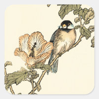 Pájaro oriental encaramado en rama