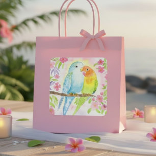 Pegatina Cuadrada Pájaros de amor con flores rosadas en acuarela