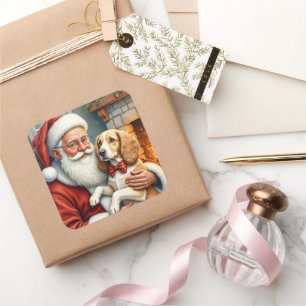 Pegatina Cuadrada Papá Noel sosteniendo un afgano hound en Navidad