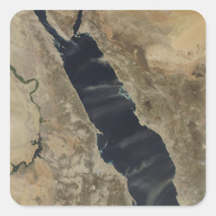 Pegatina Cuadrada Penachos del polvo sobre el Mar Rojo