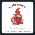 Pegatina Cuadrada Personalice Merry Christmas Santa Gnome<br><div class="desc">Personaliza esta tarjeta de Navidades lindos y festivos con tu propio nombre. Presenta un bonito gnomo de jardín en una taza con la frase "Feliz Navidad de nuestra casa a la tuya". Que su familia y amigos sepan que los recuerdan durante las vacaciones dándoles esta tarjeta clásica.</div>