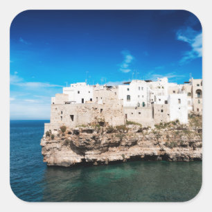 Pegatina Cuadrada Polignano a Mare casas en un acantilado en Puglia