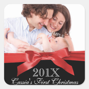 Pegatina Cuadrada Primera foto del navidad del bebé con la cinta