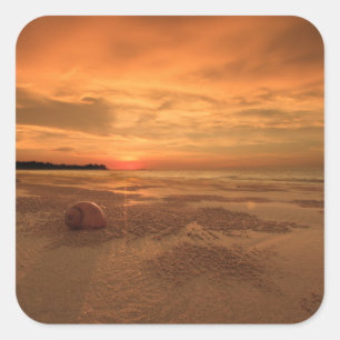 Pegatina Cuadrada Puesta del sol en una playa tailandesa