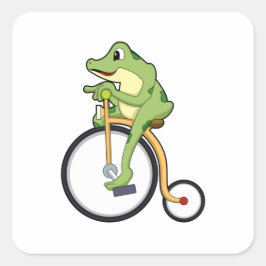 Pegatina Cuadrada Rana en circo con bicicleta.PNG