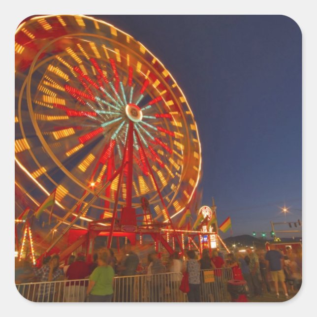 Pegatina Cuadrada Rueda de la fortuna al atardecer en el noroeste de (Anverso)
