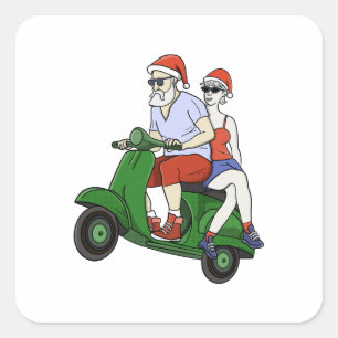 Pegatina Cuadrada Santa y la Sra. Claus montando una moto