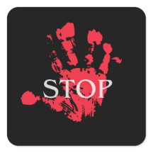 Símbolo de advertencia "STOP" con huella de mano r