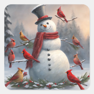 Pegatina Cuadrada Snowman con los cardenales rojos nevando