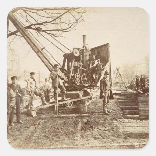 Pegatina Cuadrada Una grúa de vapor en funcionamiento durante la con (Anverso)