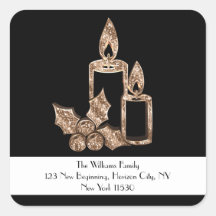 Vela negra y dorada con Navidad de acebo