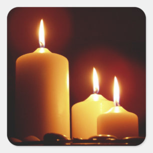 Pegatina Cuadrada Velas lisas con un resplandor rojizo, pacífico