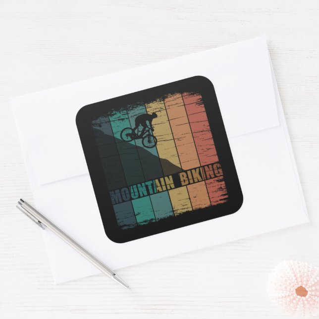 Pegatina Cuadrada Viñeta de ciclismo de montaña (Sobre)
