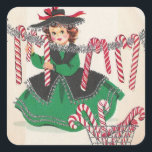 Pegatina Cuadrada Vintage Christmas Lady Colgando Candy Canes<br><div class="desc">La Retro Cute Vintage Dama De Navidad Colgando Candy Canes Como Lavandería Pegatina De La Plaza De Fiestas.</div>