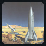 Pegatina Cuadrada Vintage Science Fiction Desert Planet con cohetes<br><div class="desc">Ilustracion vintage futurista en el espacio exterior y planetas ciencia ficción imagen del cohete. Un cohete de ciencia ficción de viajes y transporte retro en un planeta extranjero o una luna con astronautas explorando el terreno en este desconocido mundo extraterrestre. Un clásico de los años 50: el diseño de ciencia...</div>