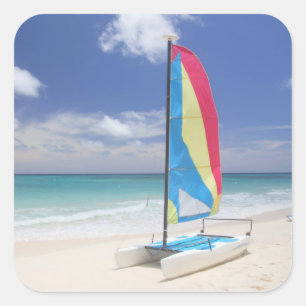 Pegatina Cuadrada Vista de la playa con velero