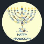 Pegatina de Círculos Concéntricos Menorah<br><div class="desc">Docenas de círculos concéntricos se forman para hacer una menorah Hanukkah iluminada. Añade tu mensaje debajo. Usar como sellos para sobres,  en regalos o como favores. También puede cambiar el fondo si lo desea. Disponible en productos coincidentes. com</div>