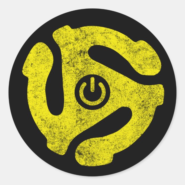 pegatina de símbolo de alimentación del adaptador  (Anverso)