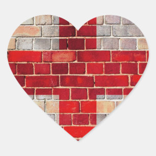 Pegatina En Forma De Corazón Bandera de Inglaterra en una pared de ladrillo