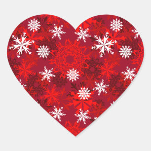Pegatina En Forma De Corazón Copos de nieve en el fondo rojo