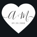 Pegatina En Forma De Corazón Monogram Script Custom Wedding date Heart<br><div class="desc">Elevate your wedding details with the Minimalist Monogram Script Custom Wedding Date Heart shaped Sticker (see other shapes). This elegant and personalized sticker adds a touch of sophistication to your wedding stationery, allowing you to showcase your monogram and wedding date in a simple yet impactful way. The sticker features a...</div>