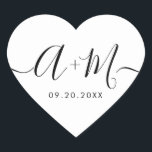 Pegatina En Forma De Corazón Monogram Script Custom Wedding date Heart<br><div class="desc">Elevate your wedding details with the Minimalist Monogram Script Custom Wedding Date Heart shaped Sticker (see other shapes). This elegant and personalized sticker adds a touch of sophistication to your wedding stationery, allowing you to showcase your monogram and wedding date in a simple yet impactful way. The sticker features a...</div>