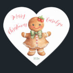 Pegatina En Forma De Corazón Pegatina Chica de Little Gingerbread<br><div class="desc">Pan de jengibre y Navidades van juntos. ¿Qué podría ser más lindo que un pequeño chica de pan de jengibre con una sonrisa grande y brillante y arcos festivos? ¡No es mucho más dulce que esto! Esta persona linda es de una acuarela vintage. "Feliz Navidad" es el saludo, junto con...</div>