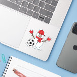 Pegatina Funny Snowman with Soccer Ball<br><div class="desc">An illustration of a snowman with a red cap, red gloves and a soccer football ball. This design is a combination of Christmas and sports spirit. Celebrating Christmas brings family together with good food and a good chat while sports brings family best bonding. If you are a winter lover, snow...</div>
