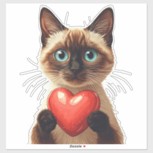 Pegatina Gato siamés adorable sosteniendo amuleto de corazó
