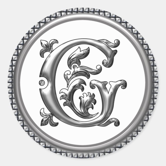 Pegatina inicial de la ronda G en plata (Anverso)
