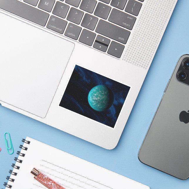 Pegatina Kepler 22b, un planeta extrasolar. (Ordenado portátil con iPhone)