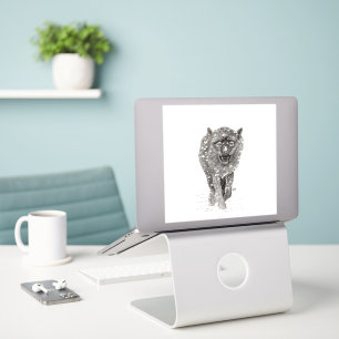 Pegatina Lobo negro enojado en la nieve, invierno salvaje