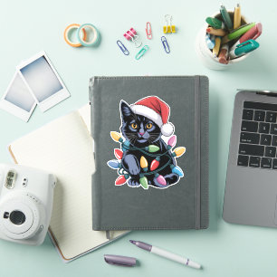 Pegatina Navidades de gatos negros iluminan a curioso amant