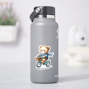 Pegatina Osito de peluche montando una bicicleta