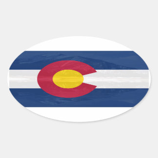 Pegatina Ovalada Bandera de Colorado con fondo de montaña