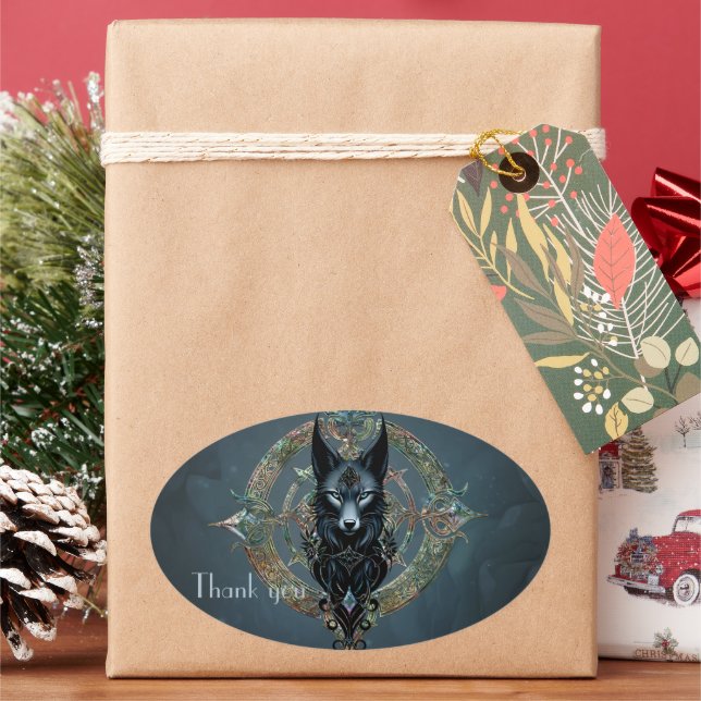 Pegatina Ovalada Cabeza de lobos negros con ojos azules penetrantes (Vacaciones)