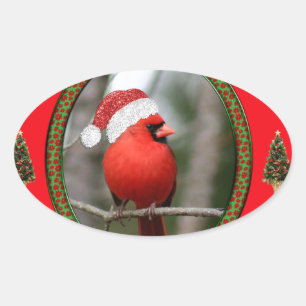 Pegatina Ovalada Cardenal y árboles de navidad en fondo rojo