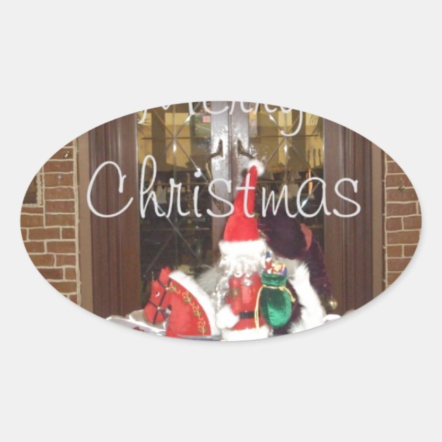 Pegatina Ovalada Feliz Navidad fuera de casa Inspirado en A (Anverso)
