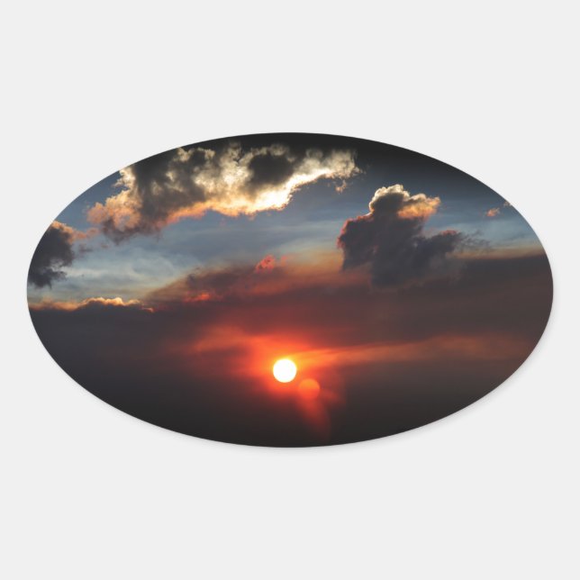 Pegatina Ovalada hermosa foto de puesta de sol con humo (Anverso)