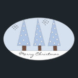 Pegatina Ovalada Icey suave Blue Christmas Trees<br><div class="desc">Un suave fondo azul bonito con tres árboles de navidad azul claro con puntos blancos y un par de copos de nieve. El dicho "Feliz Navidad" puede cambiarse si así lo desea.</div>