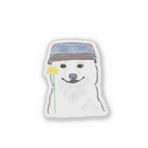 Pegatina Perro blanco lindo que lleva sombrero sosteniendo