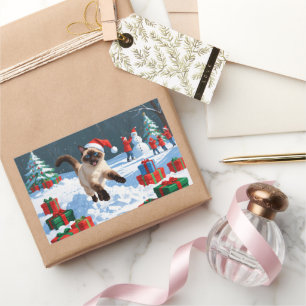 Pegatina Rectangular Gato siamés corre en Nieve con Gorra Navidad