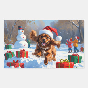 Pegatina Rectangular Spaniel Tibetano Corriendo en la Nieve con Sombrer