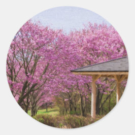 Pegatina Redonda a row of cherry blossom trees and hut