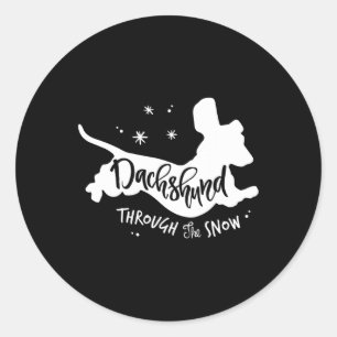 Pegatina Redonda A Través De La Nieve Navidades De Dachshund Perro