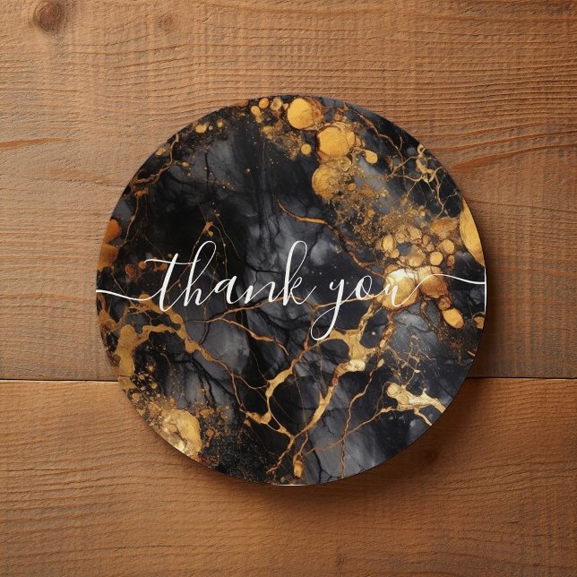 Pegatina Redonda Agradecemos al cliente de mármol negro y dorado (Black and gold marble thank you sticker with handwritten style script.)