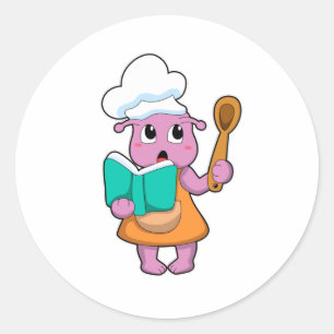 Pegatina Redonda Alien como cocinero con libro de cocina