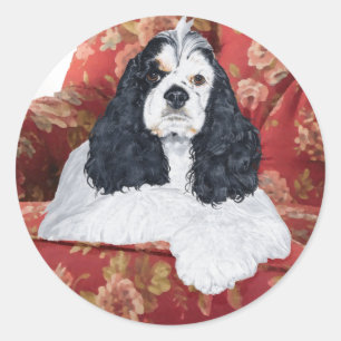 Pegatina Redonda American Cocker Spaniel en Silla Roja