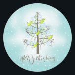 Pegatina Redonda Angel Christmas Tree Blue ID197<br><div class="desc">Un estilizado y único árbol de Navidad coronado por ángeles, latas de dulces y oropel se coloca sobre un fondo de pequeños copos de nieve para el diseño que aparece en este impactante producto. El hermoso texto del guión de 'Feliz Navidad' es opcional y puede ser borrado si lo prefiere....</div>