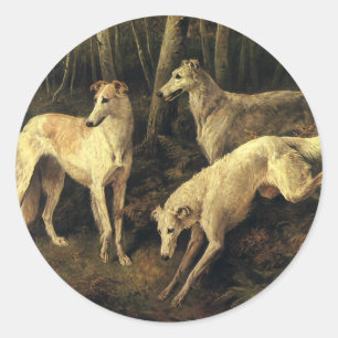 Pegatina Redonda Animales antiguos, perros de caza galgos en el bos